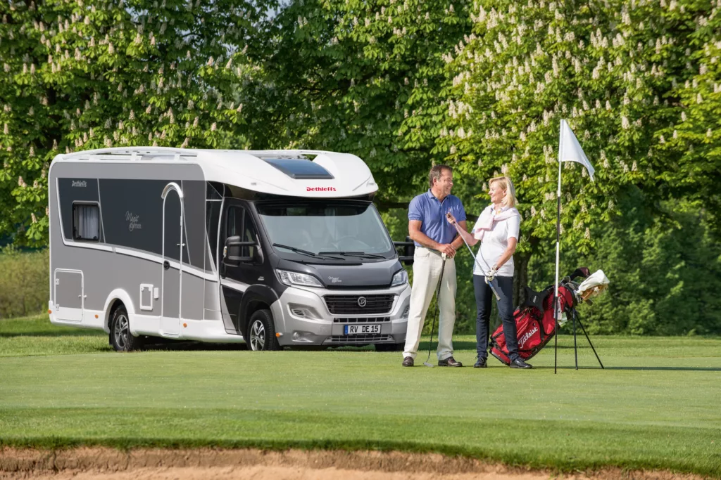 A motorhome at a golf course.
